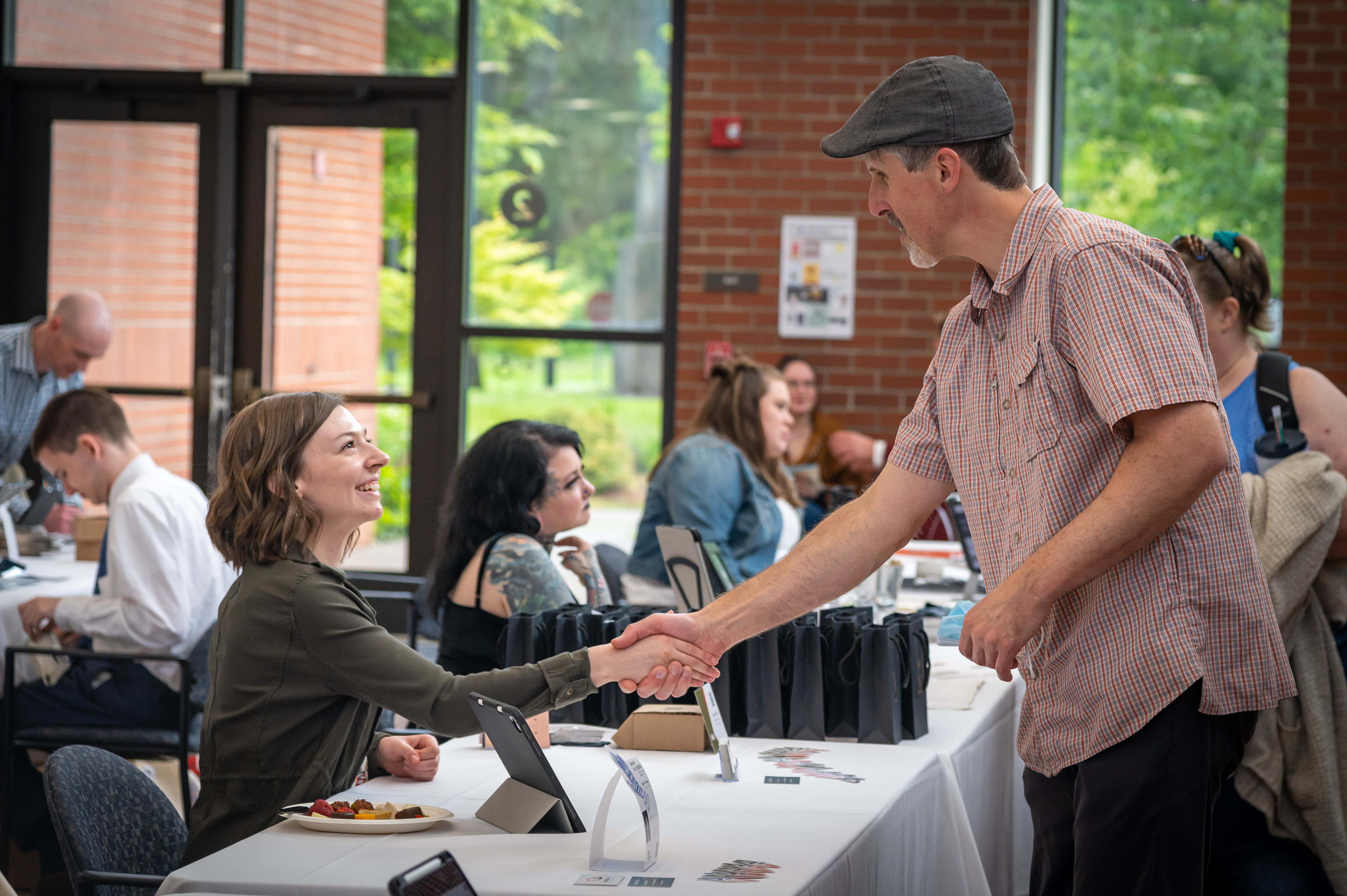 A Visual Communications student presenting their portfolio